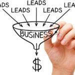 Hand drawing a sales funnel with leads and dollar sign, symbolizing conversion.